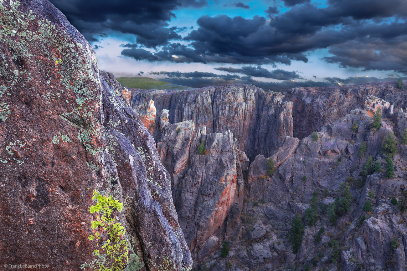 Peering into the depths of Black Canyon reveals a never ending view of impregnable towers and rock fortresses. A left fore-ground...