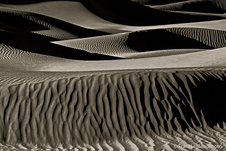 Mesquite Flat Dunes at sunset gives the viewer a limitless array of interchanging pattern and light. The interplay of light and...