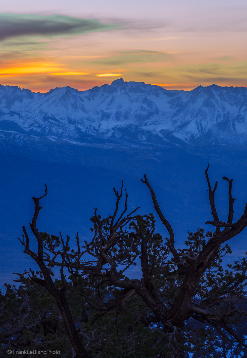 Winter sunset over the Sierra from the road to the Schulman grove of the Ancient Bristlecone pine forest.