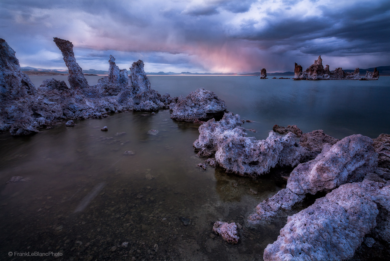 Ominous clouds move in from the northeast and collide with brightly lite clouds floating off the Sierra Nevada mountains from...