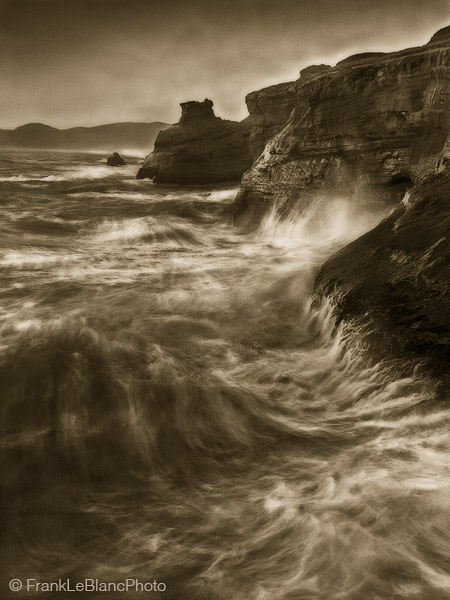 The sun has fallen behind the distant sand banks and now it is mostly moonlight illuminating the waves as they crash against...